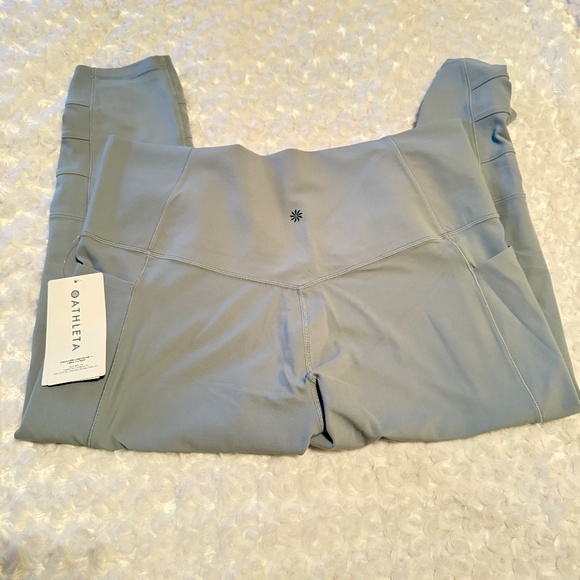 Athleta  SALUTATION STASH POCKET| CINCH 7/8 TIGHTS - Picture 2 of 8